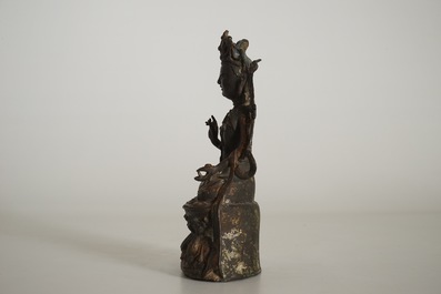 A Chinese laquered bronze figure of Guanyin, Ming