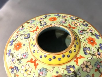 A Chinese famille rose on lime green-ground vase, Qianlong mark, 20th C.
