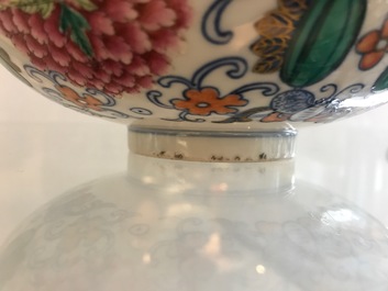 A pair of Chinese doucai bowls with floral famille rose medallions, 4-character mark, 19/20th C.