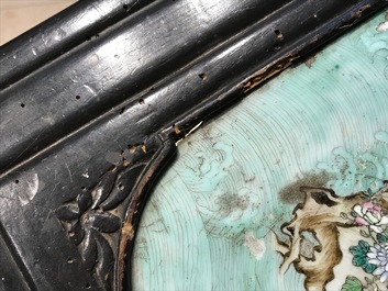 A Chinese famille rose plaque mounted as a table inset, 19th C
