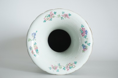 A very large Chinese famille rose vase with a peacock, 19th C.