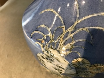A Chinese blue ground-vase with rabbits and butterflies, 19th C.
