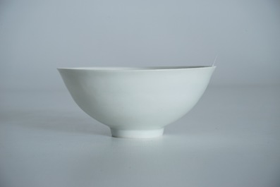 A Chinese monochrome white eggshell anhua bowl with applied design, Yongzheng mark, 19/20th C.