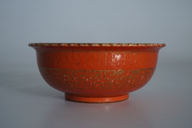 A Chinese coral-glazed and gilt bowl, Daoguang mark, 19th C.