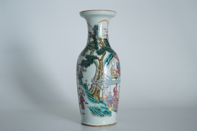 A tall Chinese famille rose vase with a fine circular design, 19th C.