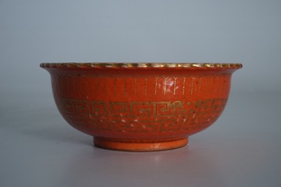 A Chinese coral-glazed and gilt bowl, Daoguang mark, 19th C.
