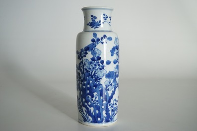 A Chinese blue and white rouleau vase with floral design, Kangxi