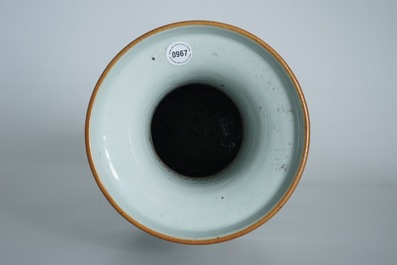 A tall Chinese famille rose vase with a fine circular design, 19th C.