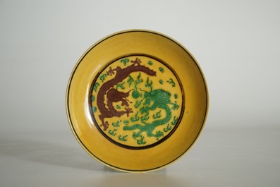 A Chinese yellow-ground dragon saucer dish, Kangxi