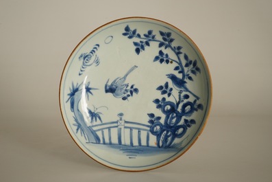 A Chinese blue and white plate with birds in a garden, Shunzhi, Transitional period
