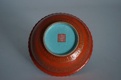 A Chinese coral-glazed and gilt bowl, Daoguang mark, 19th C.