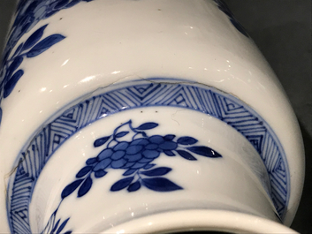 A Chinese blue and white rouleau vase with floral design, Kangxi