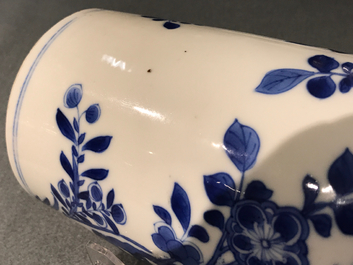 A Chinese blue and white rouleau vase with floral design, Kangxi