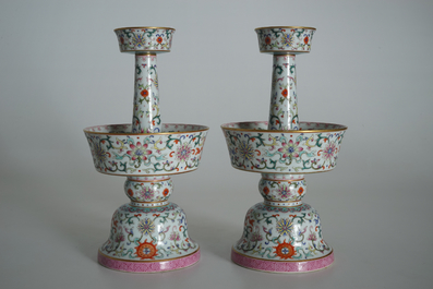 A pair of Chinese famille rose candlesticks, Jaiqing mark, 19/20th C.