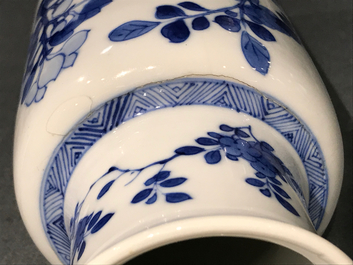 A Chinese blue and white rouleau vase with floral design, Kangxi