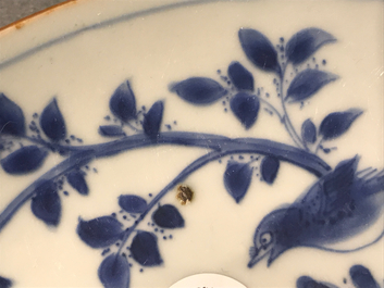A Chinese blue and white plate with birds in a garden, Shunzhi, Transitional period