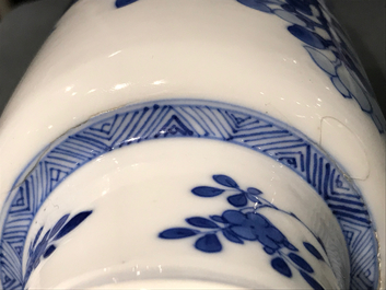 A Chinese blue and white rouleau vase with floral design, Kangxi