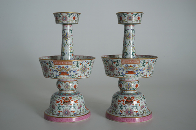 A pair of Chinese famille rose candlesticks, Jaiqing mark, 19/20th C.