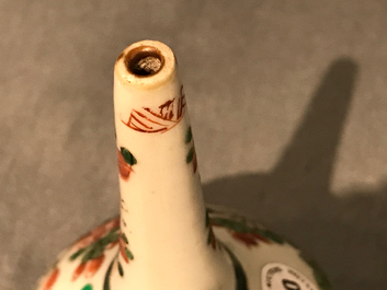 A Chinese famille verte sprinkler and a mug, Kangxi