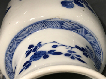 A Chinese blue and white rouleau vase with floral design, Kangxi