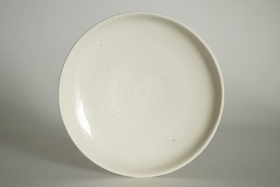 A Chinese Dehua blanc de Chine dish with incised floral design, Kangxi