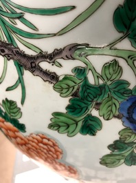 A Chinese famille verte fishbowl with birds among flowers, 19th C.