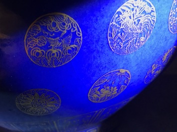 A pair of Chinese gilt-decorated powder blue-ground bottle vases, Qianlong mark, Guangxu