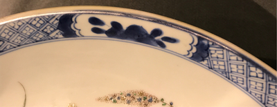 A Chinese famille verte dish with a flower basket, Kangxi