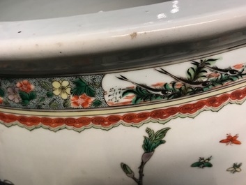 A Chinese famille verte fishbowl with birds among flowers, 19th C.
