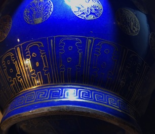 A pair of Chinese gilt-decorated powder blue-ground bottle vases, Qianlong mark, Guangxu
