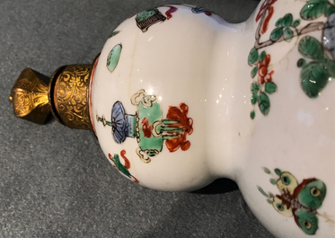 A Chinese famille verte gilt bronze-mounted double gourd vase, Kangxi