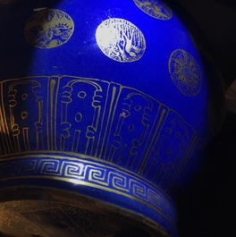 A pair of Chinese gilt-decorated powder blue-ground bottle vases, Qianlong mark, Guangxu