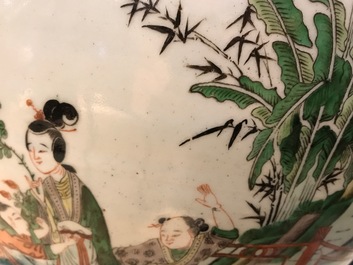A Chinese famille verte fish bowl with figural design, 19th C.