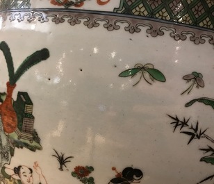A Chinese famille verte fish bowl with figural design, 19th C.