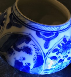 A Chinese blue and white teapot with figurative and floral panels, Kangxi