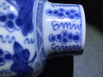 A pair of Chinese blue and white vases and covers with grapes, Kangxi