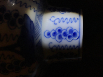 A pair of Chinese blue and white vases and covers with grapes, Kangxi