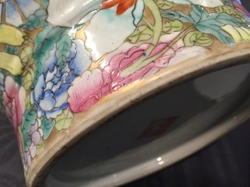 A Chinese famille rose millefleurs hu vase, Qianlong mark, 19/20th C.