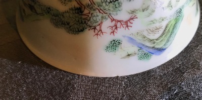 A Chinese famille rose cup and saucer with landscape design, Yongzheng