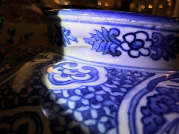 A Chinese blue and white vase with Buddhist lions and peonies, Ming, Wanli