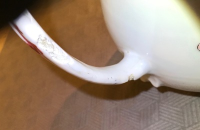 A large Chinese famille rose armorial jug with floral design, Yongzheng