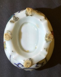 Four Chinese blue and white and famille verte miniature vases, Kangxi and later