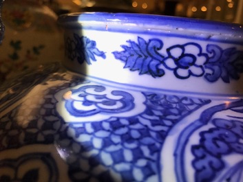 A Chinese blue and white vase with Buddhist lions and peonies, Ming, Wanli
