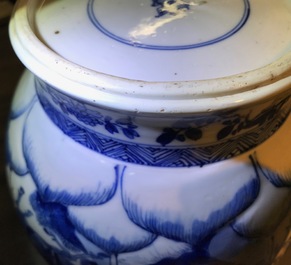 A Chinese blue and white globular vase with wooden cover and stand, Kangxi