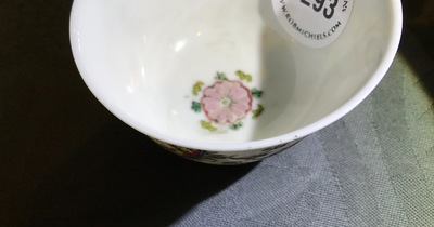 A Chinese famille rose cup and saucer, Yongzheng/Qianlong