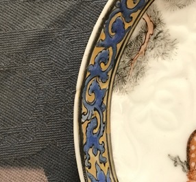 A Chinese anhua decorated cup and saucer with polychrome deer design, Yongzheng