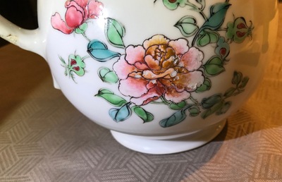 A large Chinese famille rose armorial jug with floral design, Yongzheng
