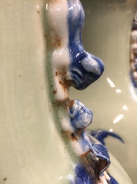 A pair of Chinese celadon-ground vases with blue and white figures, 19th C.