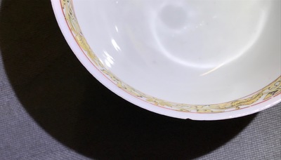 A Chinese famille rose cup and saucer with landscape design, Yongzheng