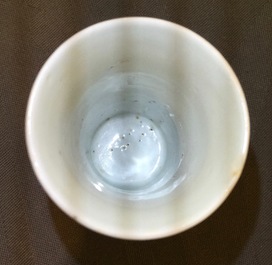 Four Chinese blue and white and famille verte miniature vases, Kangxi and later